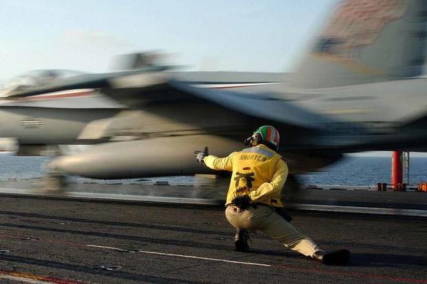 Why Navy Shooters Launch Their Boots Off of Flight Decks Military